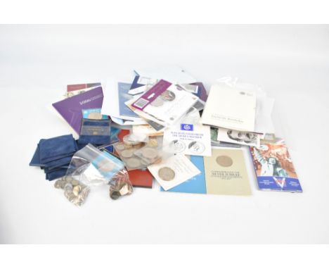A quantity of British 19th and 20th century mixed denomination coinage and commemorative collectors' plaques to include a qua