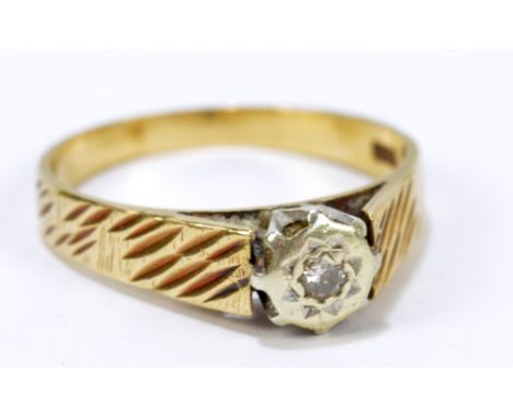 A 9ct yellow gold diamond solitaire ring in high illusion setting, with textured shanks, size P, approx 3.3g.