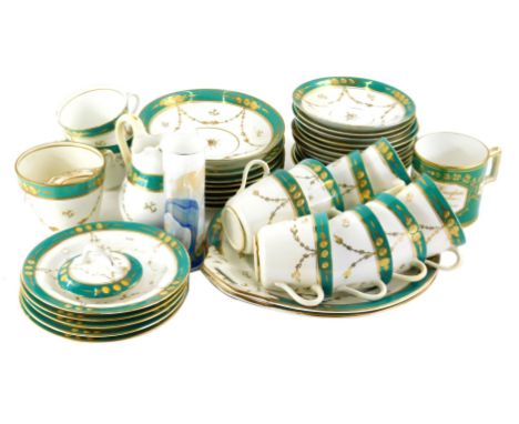 A Victorian tea service, in turquoise and white with gilt highlights, to include cups, 8cm high, serving plate, moustache cup