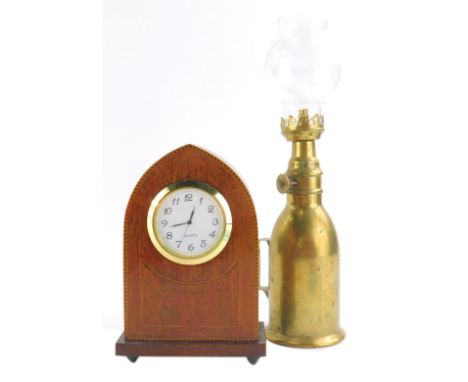 A mahogany mitre shaped mantel clock, with 5cm dia. Arabic dial, 16cm high and a small brass lamp with plain glass shade. (2)