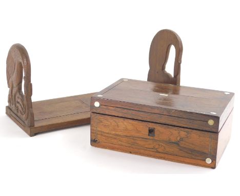 A 20thC extendable book slide, with bird ends, a 19thC rosewood and mother of pearl inlaid tea caddy, 9cm high, 22cm wide, 15