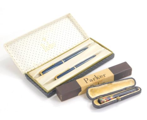 A Parker fountain pen and ball point pen set, in blue with gilt coloured trim, and arrow clip, the fountain pen with fourteen