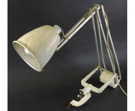 An Anglepoise style lamp, in cream with metal mounts and modern electrical feature, 49cm high. WARNING! This lot contains unt