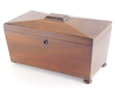 A 19thC mahogany sarcophagus shaped tea caddy, with part fitted interior, on compressed orb feet, 20cm high, 31cm wide, 16cm 