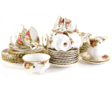 A Royal Albert Old Country Roses part dinner and tea service, to include dinner plates, 24cm dia., cups, saucers, milk jug, s