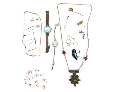 A group of costume jewellery, comprising a silver and enamel wristwatch head (AF), pendant mount stone set stick pin, stainle