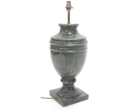 A turned urn shaped composite marble table lamp, with brass and silver fitting, 60cm high.