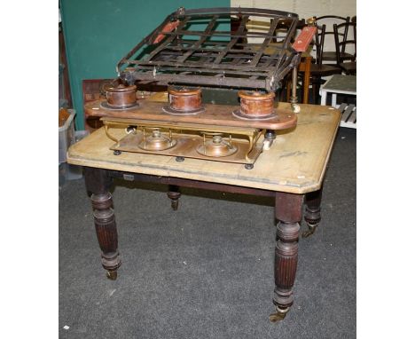 An Edwardian extending dining table, a steel steamer chair, a copper two lamp warming stand, filing drawers and a hand crafte