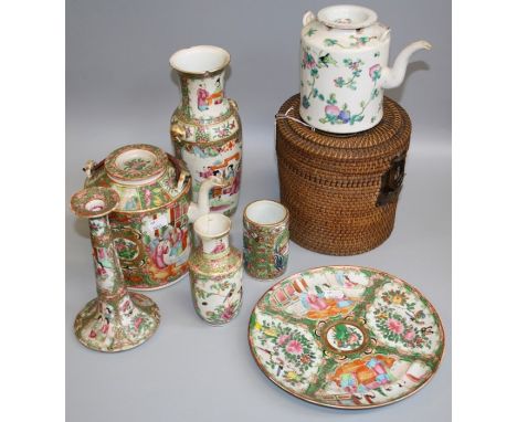 An early 20th century Chinese Canton famille rose tea pot and cover, together with another in woven cane case, a plate, singl