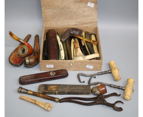 A collection of approximately twenty Edwardian and other straight razors, four bone handled fruit knives, four mutton bone ma