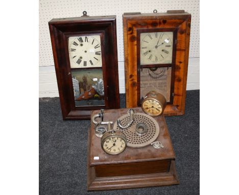 Two late 19th century New Haven wall clocks, an oak cased table gramophone, a slate mantle clock and a brass drum cased Germa