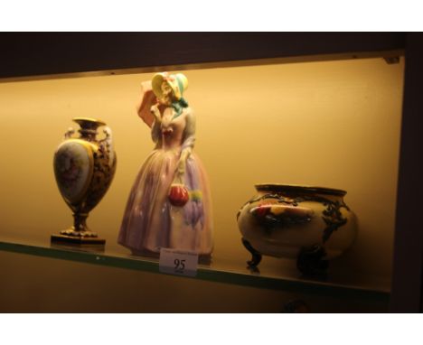 A small Royal Doulton rose decorated bowl; together with a royal Worcester floral decorated vase painted by E Phillips  AF; a