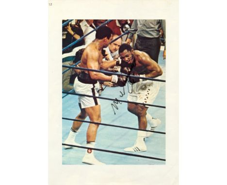 ALI MUHAMMAD: (1942-2016) American Boxer, World Heavyweight Champion. Signed colour 8 x 11 printed image to a page removed fr