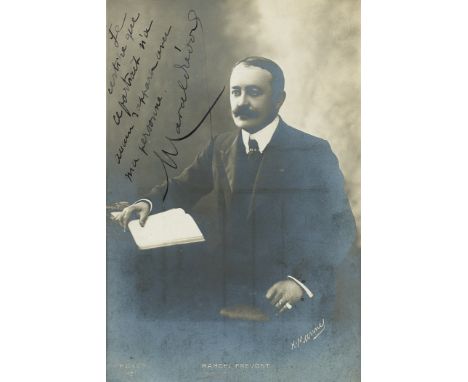 PREVOST MARCEL: (1862-1941) French Author. Vintage signed postcard photograph by Prevost, with a funny statement in his hand,