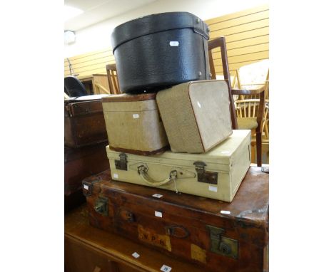 A good selection of vintage luggage, some with travel labels and including hat boxes Condition reports provided on request by