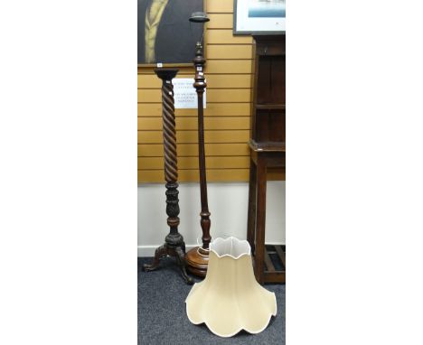 A vintage mahogany circular base reeded standard lamp together with a carved and spiral turned torchiere Condition reports pr