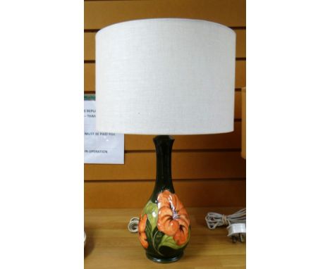 A green ground Moorcroft slipper orchid patter table-lamp &amp; shade Condition reports provided on request by email for this