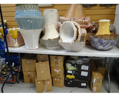 A large quantity of lamp shades ETC (on table and beneath) Condition reports provided on request by email for this auction ot