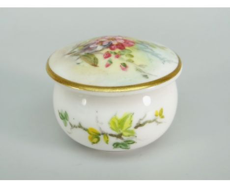 A Royal Worcester porcelain miniature box of circular form with domed lid painted with flowers, date mark for 1913 (BBC Barga