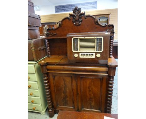 Large raised back sideboard with moulded surround and shelf on bobbin supports and with drawer and cupboard together with mid