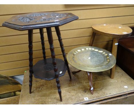 A simple rustic joined oak stool, a brass Benares tea table on a folding naturalistic base and a carved top bobbin supported 