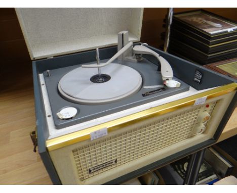 Cased Monarch record player turn-table, circa 1960 Condition reports provided on request by email for this auction otherwise 