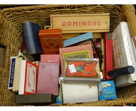 A modern basket containing mid-century and vintage playing card games, sets of domino's ETC Condition reports provided on req