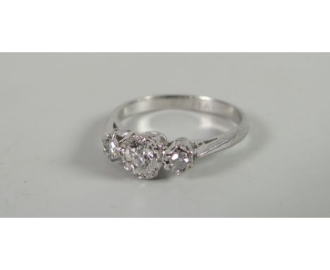 Platinum 18ct three-stone diamond ring Condition reports provided on request by email for this auction otherwise items purcha