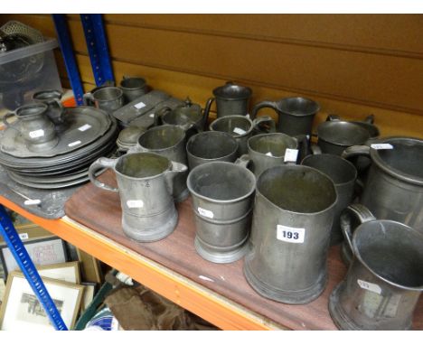 Parcel of assorted pewter to include various sized tankards, jugs together with twin-handled tray, plates, inkwell, cigarette