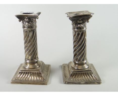 A pair of London silver architectural candlestick holders (loaded) Condition reports provided on request by email for this au