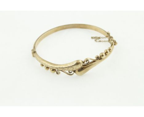 A 9 carat H/M  bangle, approx. 8.9 gms