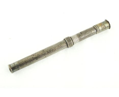 A Georgian silver dip pen with engine turned decoration, H/M Birmingham 1824