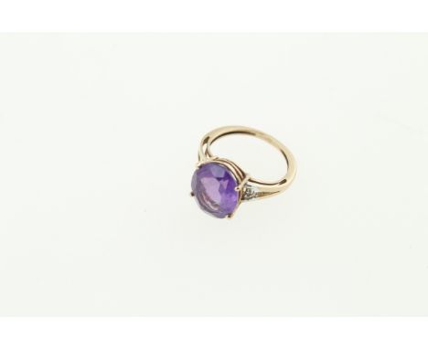 A 9ct H/M amethyst & diamond ring