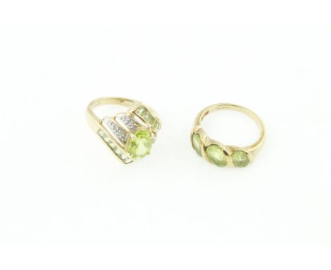Two 9ct H/M peridot rings, one diamond set, approx gross weight 5.7gms