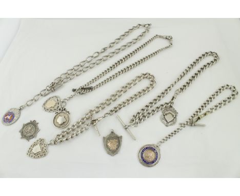 Five silver Albert chains (two double) one T-bar metal, with eight silver H/M shield fobs, & a selection of watch keys, appro