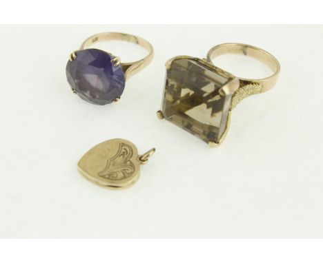 Two large  gems set rings, both stamped 14 K, approx. gross weight 21 gms, together with a 9ct H/M locket approx. 2.5 gms