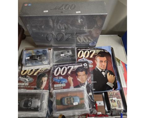 COLLECTION OF 007 JAMES BOND MODEL CARS, MAGAZINES, ULTIMATE JAMES BOND 007 40 DISC DVD SET, UNOPENED
