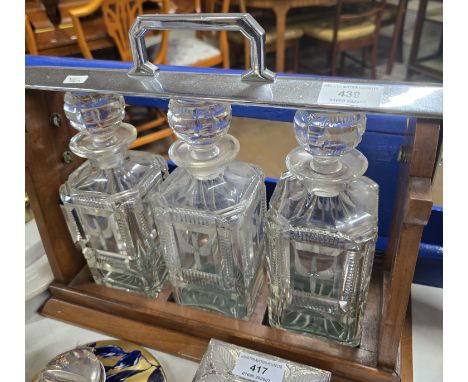 3 BOTTLE MAHOGANY FRAMED TANTALUS MADE IN ENGLAND     