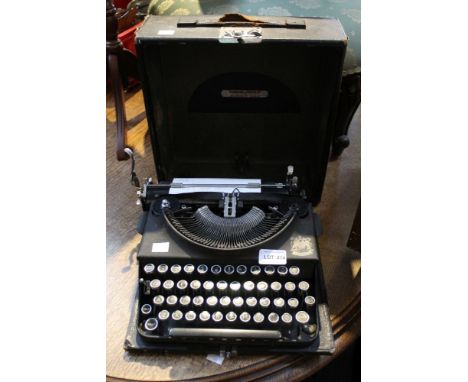 A vintage imperial "The Good Companion" portable typewriter in original carrycase