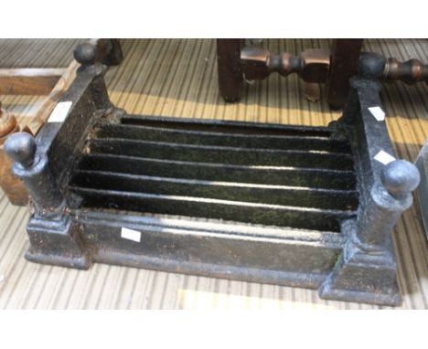 A cast iron vintage boot scraper