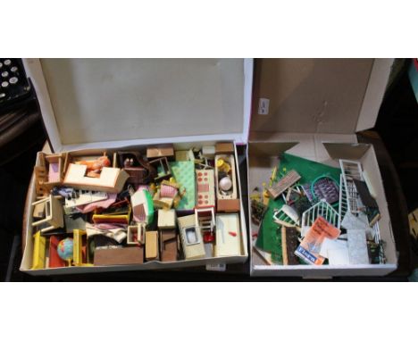 A box containing a good selection of vintage dolls house furniture with a child's garden construction set&nbsp;