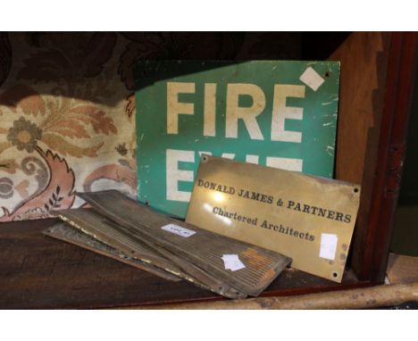 A vintage fire exit sign with a brass architects plaque and four vintage door finger plates (6)