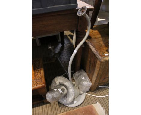 A pair of vintage cast swan neck exterior wall lights