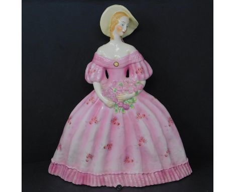 A Catherine Barjansky ceramic model of a lady with a bouquet of flowers, for Boch Frères Keramis, H.42 W.39 D.14cm 