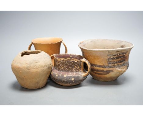 Four Chinese Neolithic pottery vessels, 11cm