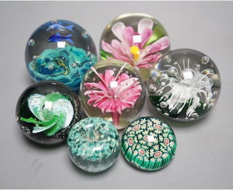 A group of glass paperweights including Caithness