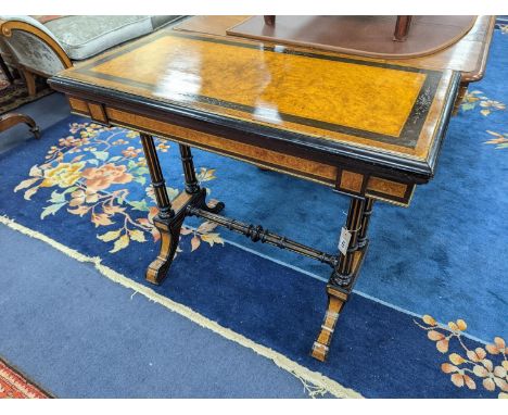 A Victorian part ebonised rectangular Amboyna folding card table, width 91cm, depth 46cm, height 77cm