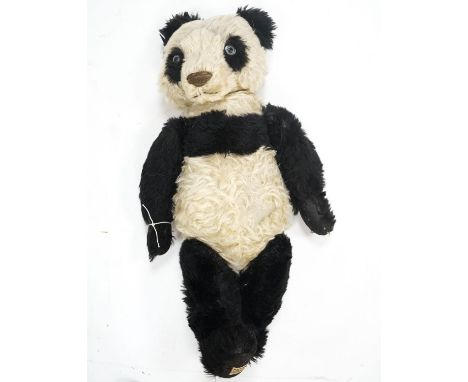 A Merrythought Panda 1930's Label Reg. Design, very good condition, slight thinning right side of tummy, 25in.