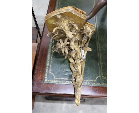 A Victorian giltwood and gesso corner wall bracket, height 46cm