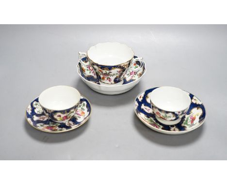 A Worcester scale blue chocolate cup and saucer and a pair of similar tea bowls and saucers, circa 1775